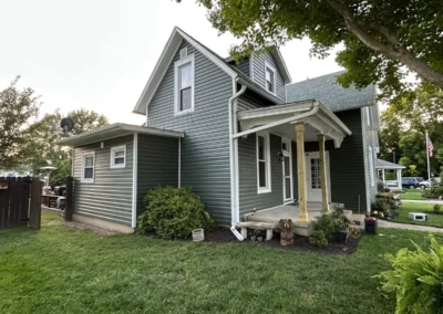 Completed gray siding installation on a home in Delphi, Indiana