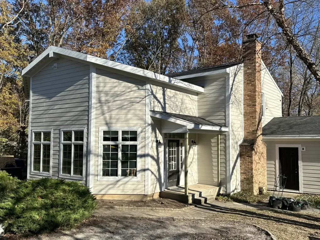 Exterior Renovation in Lafayette, Indiana White-trimmed windows and gray siding on a Lafayette home